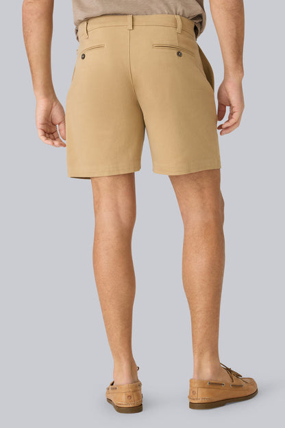 Back view of a man wearing Stretch Twill Chino Shorts 7" in Sisal