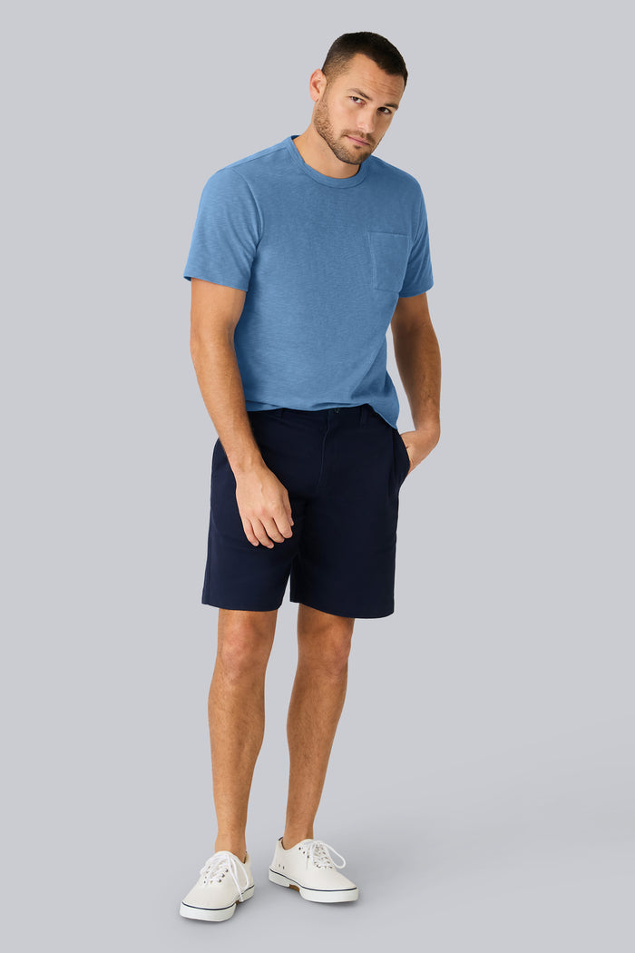 Full front view of a man wearing Stretch Twill Chino Short 9" in Night Sky