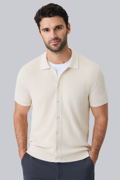 Front view of a man wearing Tech Linen Button Up Sweater Polo in Latte Heather