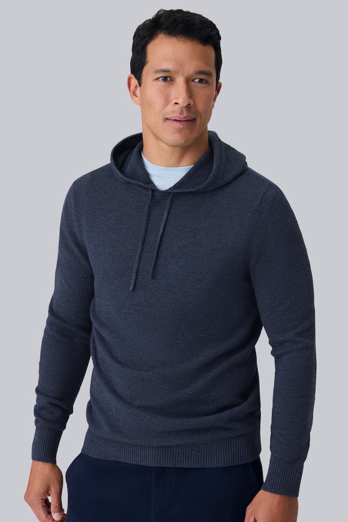 Front view of a man wearing Tech Linen Long Sleeve Hoodie in Navy Heather