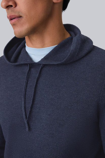Detailed front view of a man wearing Tech Linen Long Sleeve Hoodie in Navy Heather