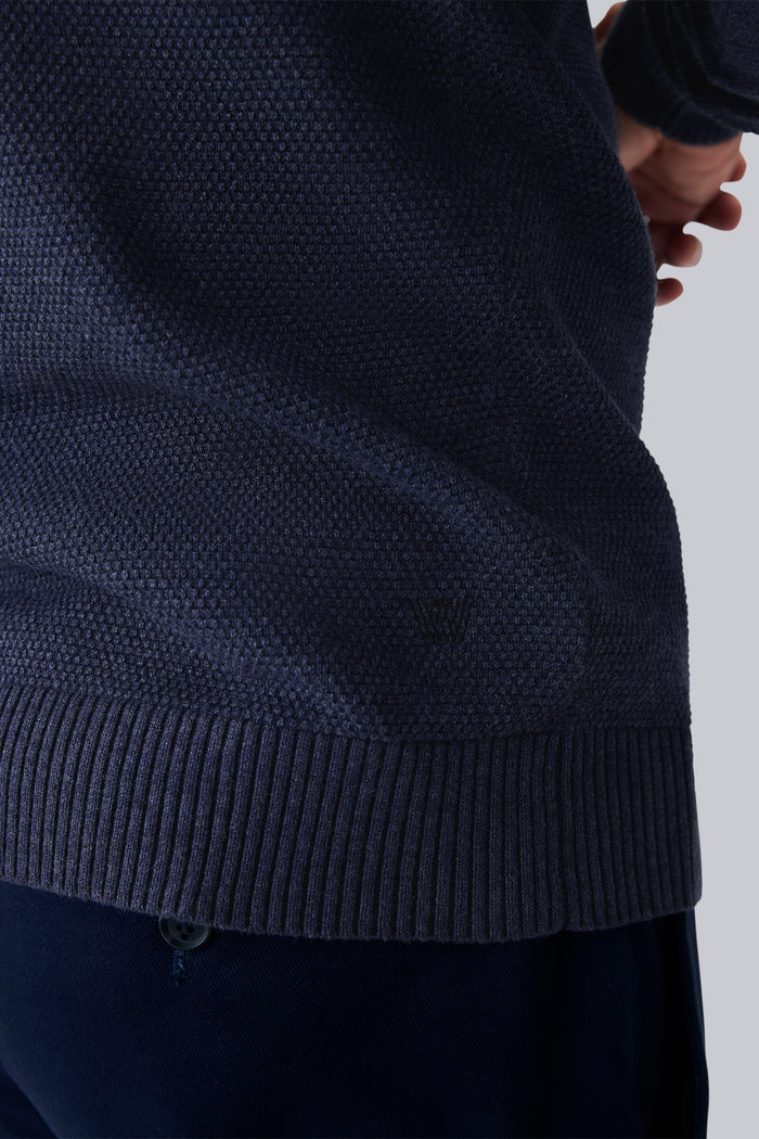 Detailed back view of Tech Linen Long Sleeve Hoodie in Navy Heather with Mack Weldon logo