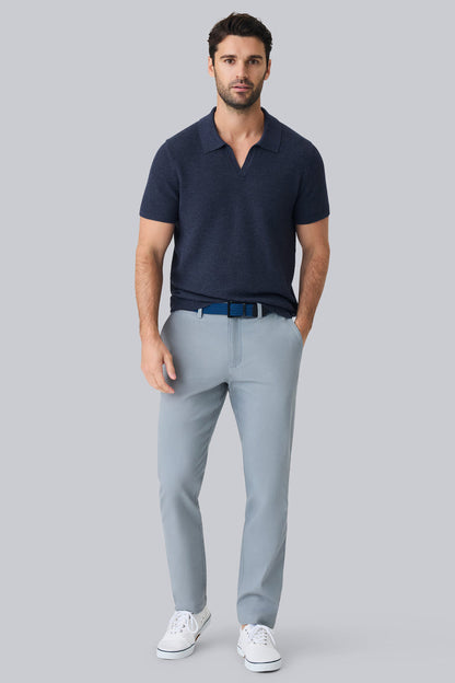 Full front view of a man wearing Tech Linen Johnny Collar Sweater Polo in Navy Heather