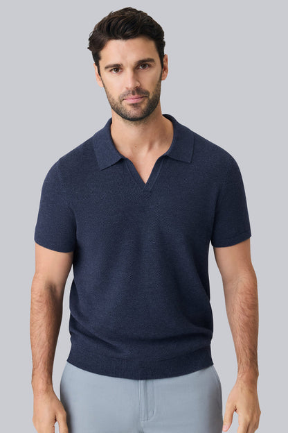 Front view of a man wearing Tech Linen Johnny Collar Sweater Polo in Navy Heather