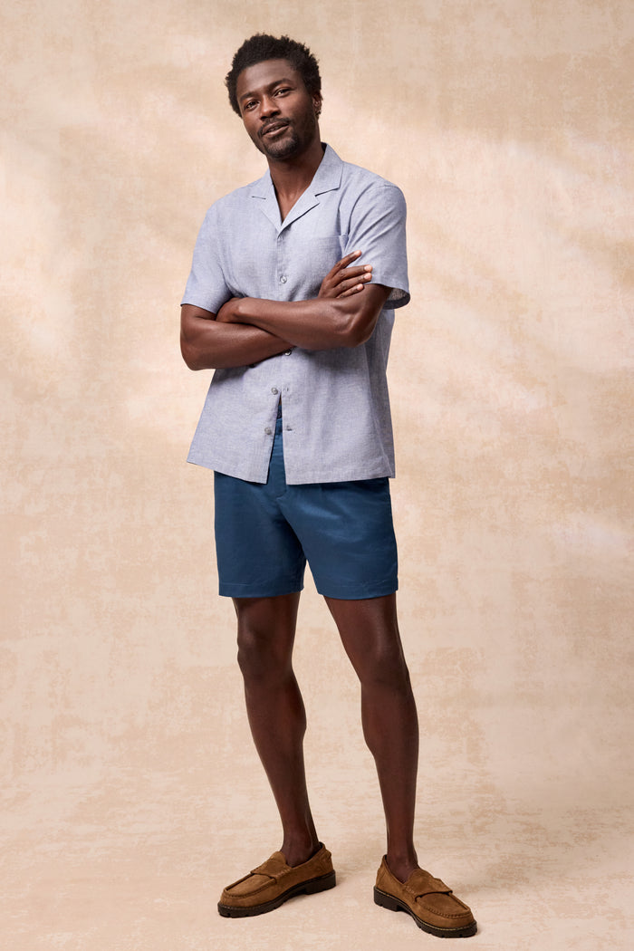 Full front view of a man wearing Tech Linen Pleated Short in Midnight Blue