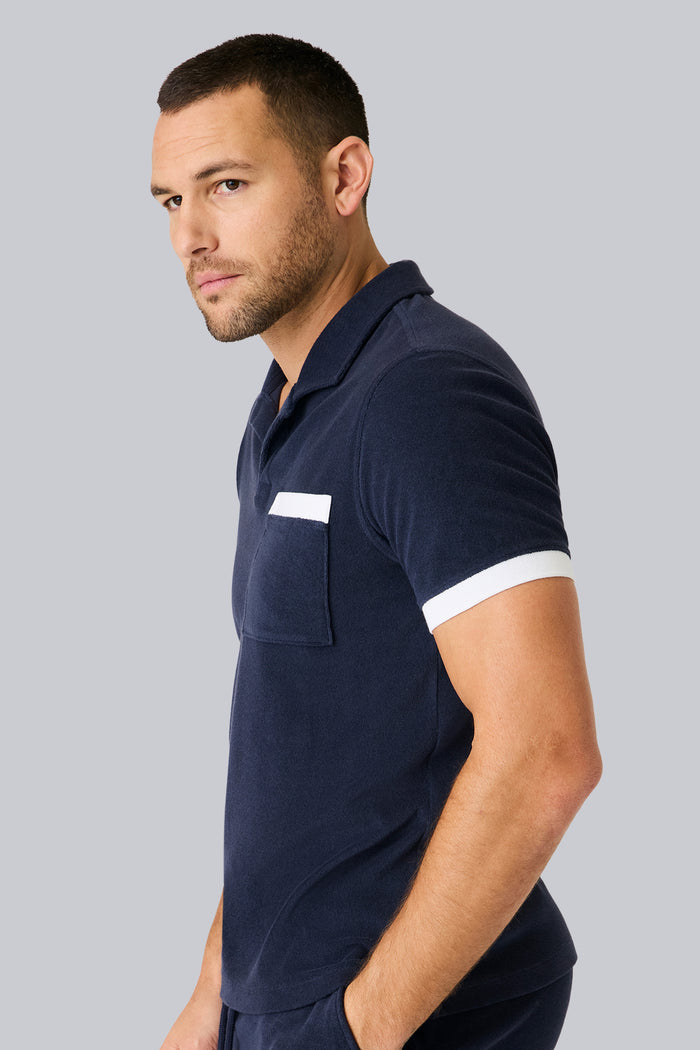 Side view of a man wearing Terry Cloth Johnny Collar Polo in Night Sky