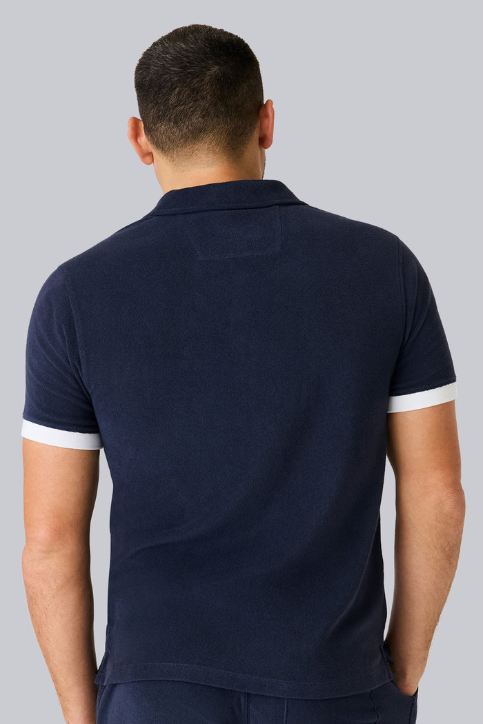 Back view of a man wearing Terry Cloth Johnny Collar Polo in Night Sky