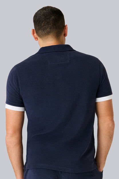 Back view of a man wearing Terry Cloth Johnny Collar Polo in Night Sky
