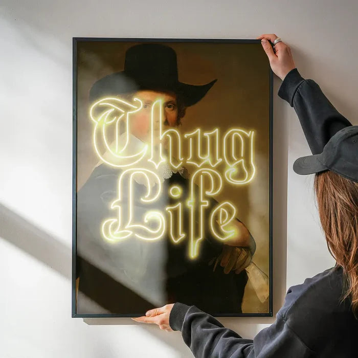 Thug Life Neon Altered Art Print being hung on a wall in a black frame