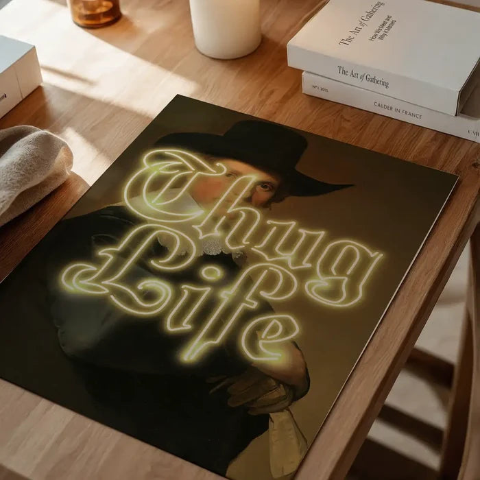 Thug Life Neon Altered Art Print, quirky altered art print unframed on a home office desk