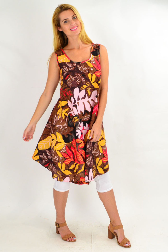 Tropical Autumn Leaf Linen Cotton Tunic Dress by Ruby Rain featuring a relaxed fit and vibrant leaf print on lightweight fabric.