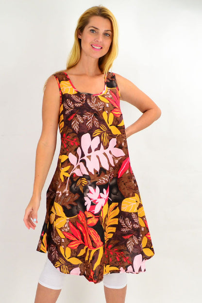 Tropical Autumn Leaf linen cotton tunic dress by Ruby Rain featuring a colorful leaf pattern and relaxed fit.