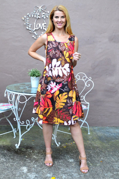 Sleeveless linen cotton tunic dress with tropical autumn leaf pattern by Ruby Rain, perfect for casual summer or fall wear.