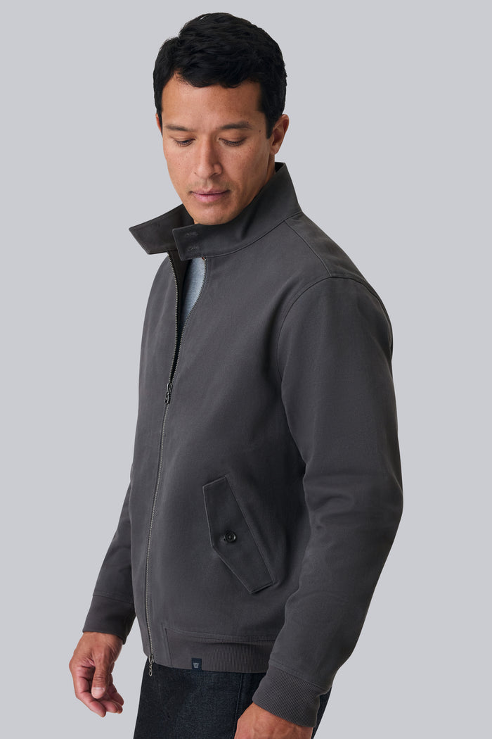 Side view of a man wearing Twill Harrington Jacket in Asphalt