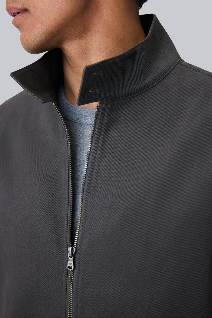 Detailed front view of a man wearing Twill Harrington Jacket in Asphalt