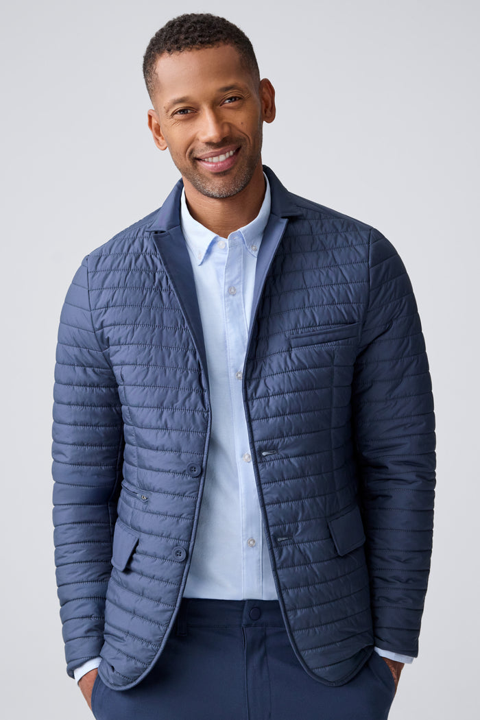 Front view of a man wearing Warmknit air blazer in Total Eclipse/True Black Liner