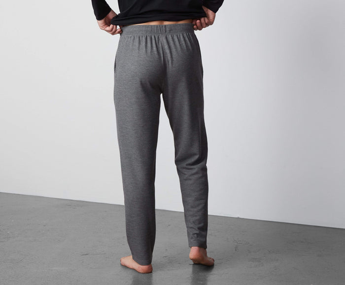 Back view of a man wearing WARMKNIT Pajama Pant in Grey Heather