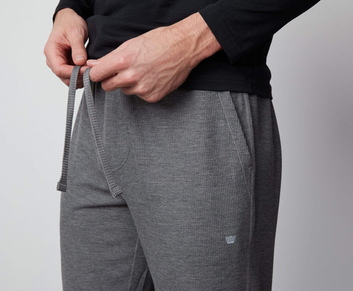Detailed front view of a man wearing WARMKNIT Pajama Pant in Grey Heather