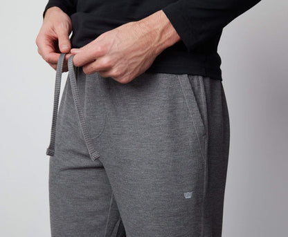 Detailed front view of a man wearing WARMKNIT Pajama Pant in Grey Heather