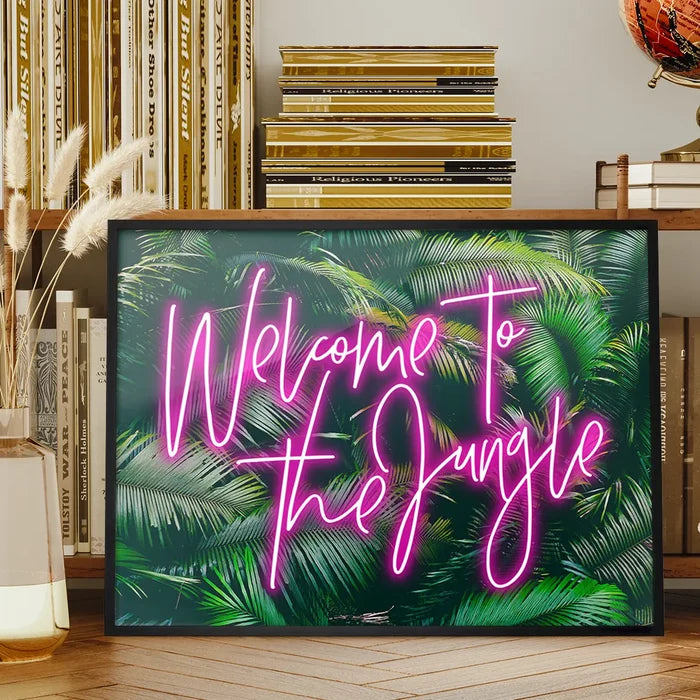 Welcome To The Jungle Tropical Neon Print framed on a living room bookshelf
