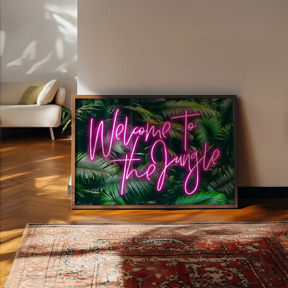 Welcome To The Jungle Tropical Neon Print framed, leaning on a wooden floor beside a rug