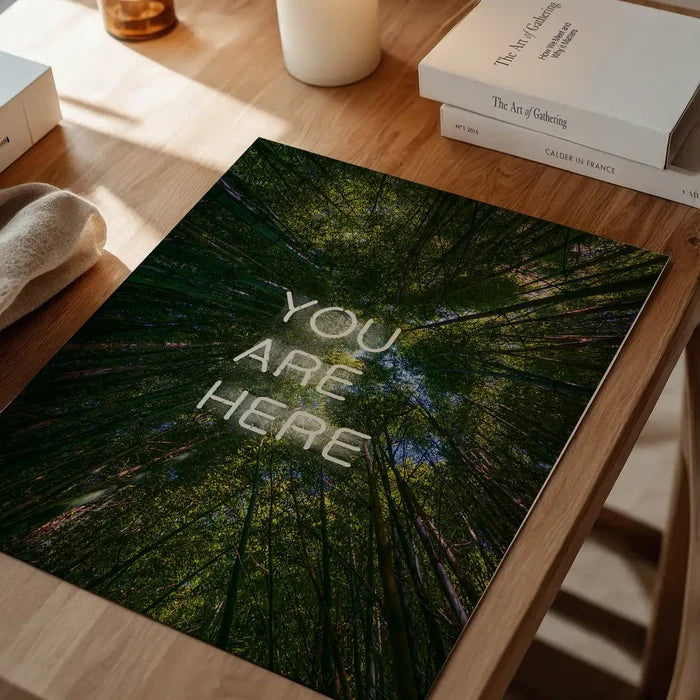 You Are Here neon-style graphic print featuring a low-angle forest canopy view on archival art paper.