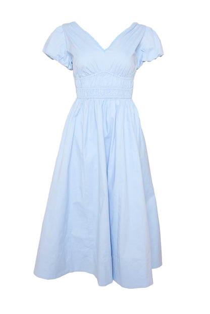blue dress against a white background